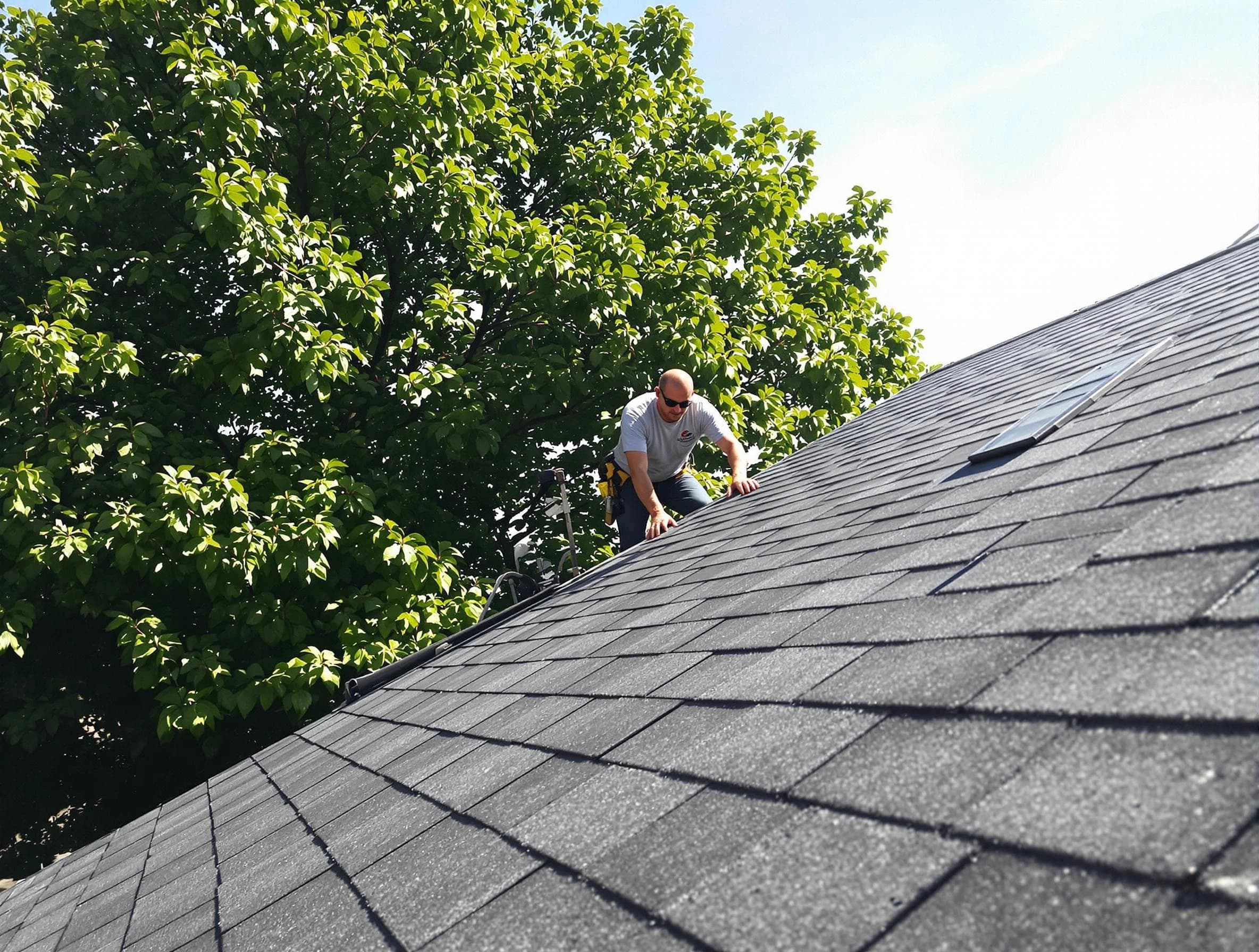 Certified roofers from Willoughby Roofing Company working in Willoughby, OH